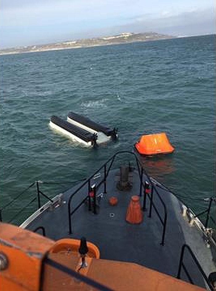 Fishermen saved by Navy vessel after firing flares