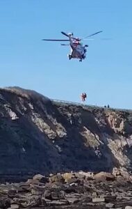 Smoke flare helps helicopter crew in rescue