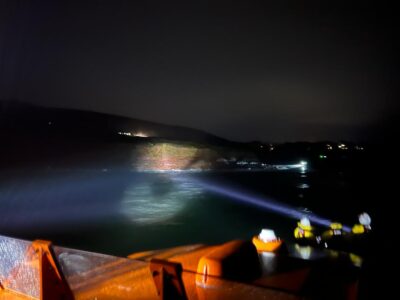 Ironman racer abandons training for capsized boat rescue