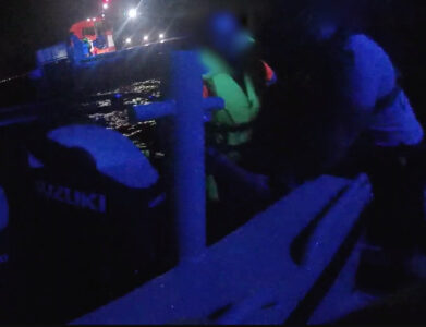 Flares fired by two men after boat sinks
