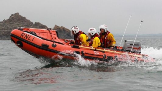 Flares fired after RNLI crew fall into water